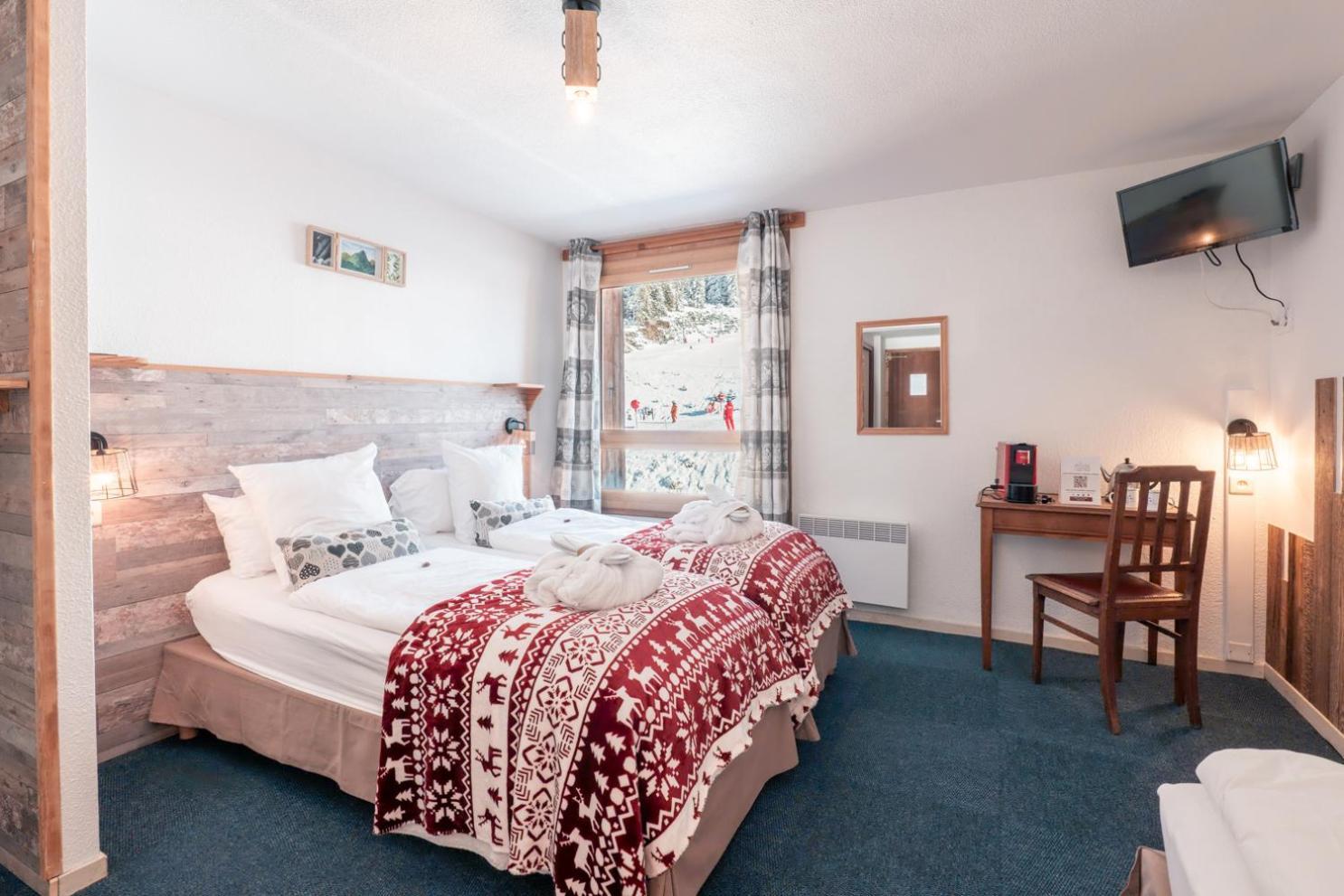 Chambre Triple – Vue sur Montagne